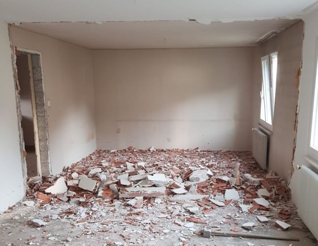 an aerial view of a winding road in the countryside
